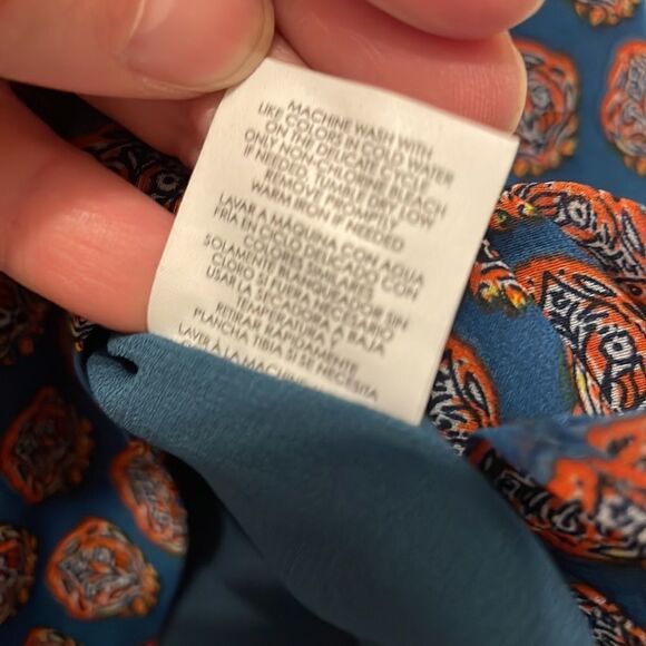 CAbi Medallion Reign Sleeveless Ruffle Front Blouse - Picture 6 of 8